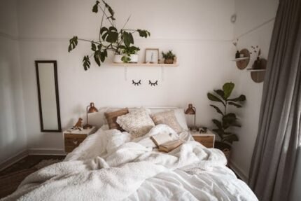 A modern bedroom interior with minimalistic design, plants, and cozy textiles, perfect for home decor inspiration.